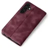 A close-up, angled view of a burgundy flip phone case. Produktbild-Vorschau