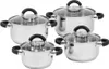 A set of four stainless steel pots with glass lids and black handles, arranged in a diagonal formation on a white background. Produktbild-Vorschau