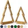 Two wooden Christmas trees of different sizes, made of interlocking wooden pieces, are displayed against a white background. Below the trees are several colored circles representing different color options. Náhled obrázku produktu