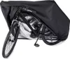 A black bicycle cover is draped over a bicycle, partially obscuring it. The cover is made of a waterproof material. Náhľad obrázku produktu