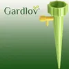 A green plant watering cone with a yellow valve, branded with "Gardlov". Voir les images du produit