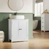 A bathroom vanity with a vessel sink, a round mirror above it, and a bathtub in the background. Produktbild-Vorschau