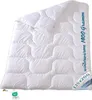 A white duvet folded and laid out on a white background. Produktbild-Vorschau