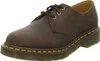 A single brown Dr. Martens shoe is shown from a side-angle on a white background. Anteprima dell’immagine prodotto