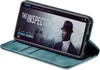 A smartphone in a flip case is displayed on a surface, with the phone screen showing a movie interface. Produktbild-Vorschau