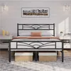 A bedroom scene featuring a black metal bed frame with a white headboard and a brown pillow. Produktbild-Vorschau