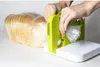 Hands using a green and white bread bag sealer next to a loaf of sliced bread. Náhled obrázku produktu