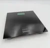 A black digital bathroom scale with a green display screen and the Omron logo on a white background. Podgląd zdjęcia produktu