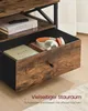 A close-up view of an open drawer in a TV stand, showing storage space and some items within. Produktbild-Vorschau