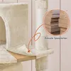A close-up view of a beige cat tree, highlighting its construction with a torn-away section revealing the wood panels underneath. Produktbild-Vorschau