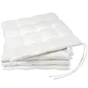 A stack of four cream-colored seat cushions with ties, presented on a white background. Produktbild-Vorschau