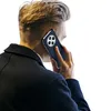 A person is holding a smartphone to their ear, viewed from behind. Produktbild-Vorschau