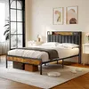 A bedroom scene with a bed, nightstands, and artwork on the wall. Náhled obrázku produktu