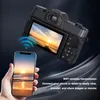 A hand holding a smartphone is shown below a digital camera, with a graphic indicating a WiFi connection between them. Podgląd zdjęcia produktu