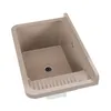 A beige sink basin with a ribbed drainboard. Anteprima dell’immagine prodotto