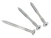 Three silver screws are arranged diagonally on a white background. Podgląd zdjęcia produktu