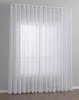 A white sheer curtain hanging in front of a window. Produktbild-Vorschau