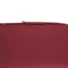 A close-up view of the top edge of a bordeaux red cushion, showing the stitching and a folded edge. Náhled obrázku produktu
