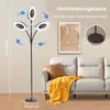 A floor lamp with integrated fan and lights is shown in a living room setting next to a sofa. Anteprima dell’immagine prodotto