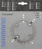 The image shows the packaging of a bicycle chainring, with the chainring itself visible. Produktbild-Vorschau