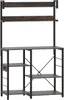 A freestanding kitchen shelf unit with multiple shelves and a metal frame. Náhled obrázku produktu
