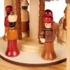 A close-up view of a wooden Christmas pyramid with figures. Náhled obrázku produktu
