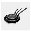 Three frying pans of different sizes stacked on top of each other. Podgląd zdjęcia produktu
