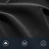 A close-up of black fabric with three circular icons at the bottom. Produktbild-Vorschau