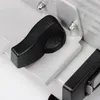 A close-up view of a black adjustment knob on a gray and white food slicer. Anteprima dell’immagine prodotto