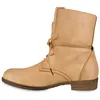 A side view of a single khaki boot against a white background. Produktbild-Vorschau
