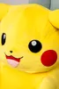 A close-up of a large yellow plush toy, resembling a Pikachu character, with its face prominently displayed. Produktbild-Vorschau