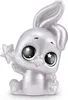 A small, silver, stylized bunny figurine with large, black, star-shaped eyes, sitting and holding a star wand. Náhled obrázku produktu