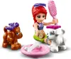 A LEGO Friends character is playing with two puppies, brushing one and offering food to the other. Náhľad obrázku produktu