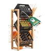 A wooden shelf holding three crates of bottles, with orange powder exploding around it. Produktbild-Vorschau