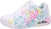 A white Skechers sneaker with a colorful heart pattern. Produktbild-Vorschau