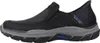 Side view of a black Skechers slip-on shoe with a gray sole. Produktbild-Vorschau