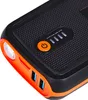 Close-up of a black and orange jump starter power bank. Náhled obrázku produktu