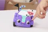 A hand is pressing on a toy car with a cat figurine inside. Anteprima dell’immagine prodotto