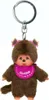 A Monchhichi keychain with a pink bib, shown against a white background. Produktbild-Vorschau