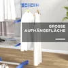 A drying rack with clothes and towels hanging on it, with text overlay. Náhled obrázku produktu