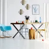 A dining room setting with a table and chairs, featuring a modern industrial design. Podgląd zdjęcia produktu