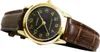 A close-up shot of a gold-toned Casio watch with a black face and a brown leather strap. Produktbild-Vorschau