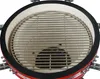 A close-up view of the interior of a red ceramic grill, showing the cooking grate. Produktbild-Vorschau