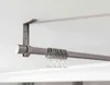 A close-up view of a ceiling-mounted curtain rod with rings. Produktbild-Vorschau