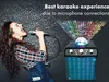 A woman singing into a microphone with a karaoke speaker in the background, featuring a light show. Produktbild-Vorschau