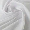 A close-up, swirled view of white fabric with subtle polka dots. Náhľad obrázku produktu