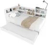 A white daybed with a pull-out trundle bed and integrated shelving unit. Produktbild-Vorschau