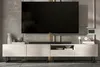 A modern TV stand with a large television mounted above it. Produktbild-Vorschau