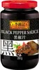 A jar of Lee Kum Kee Black Pepper Sauce with a piece of steak on the label. Voir les images du produit