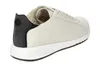 A side view of a white Geox sneaker with a black heel accent. Náhled obrázku produktu